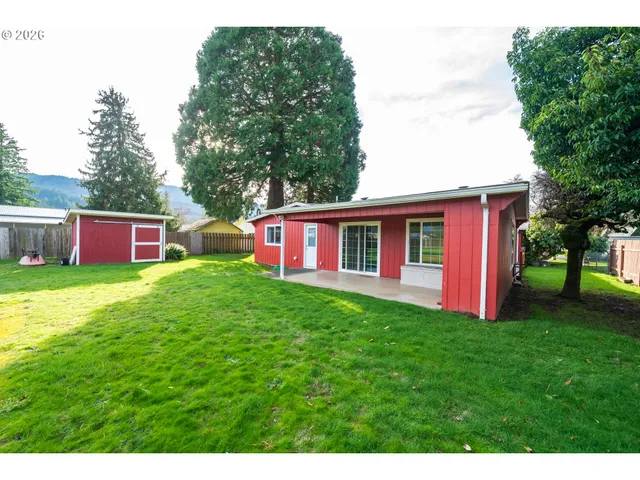 a view of a house with a big yard
