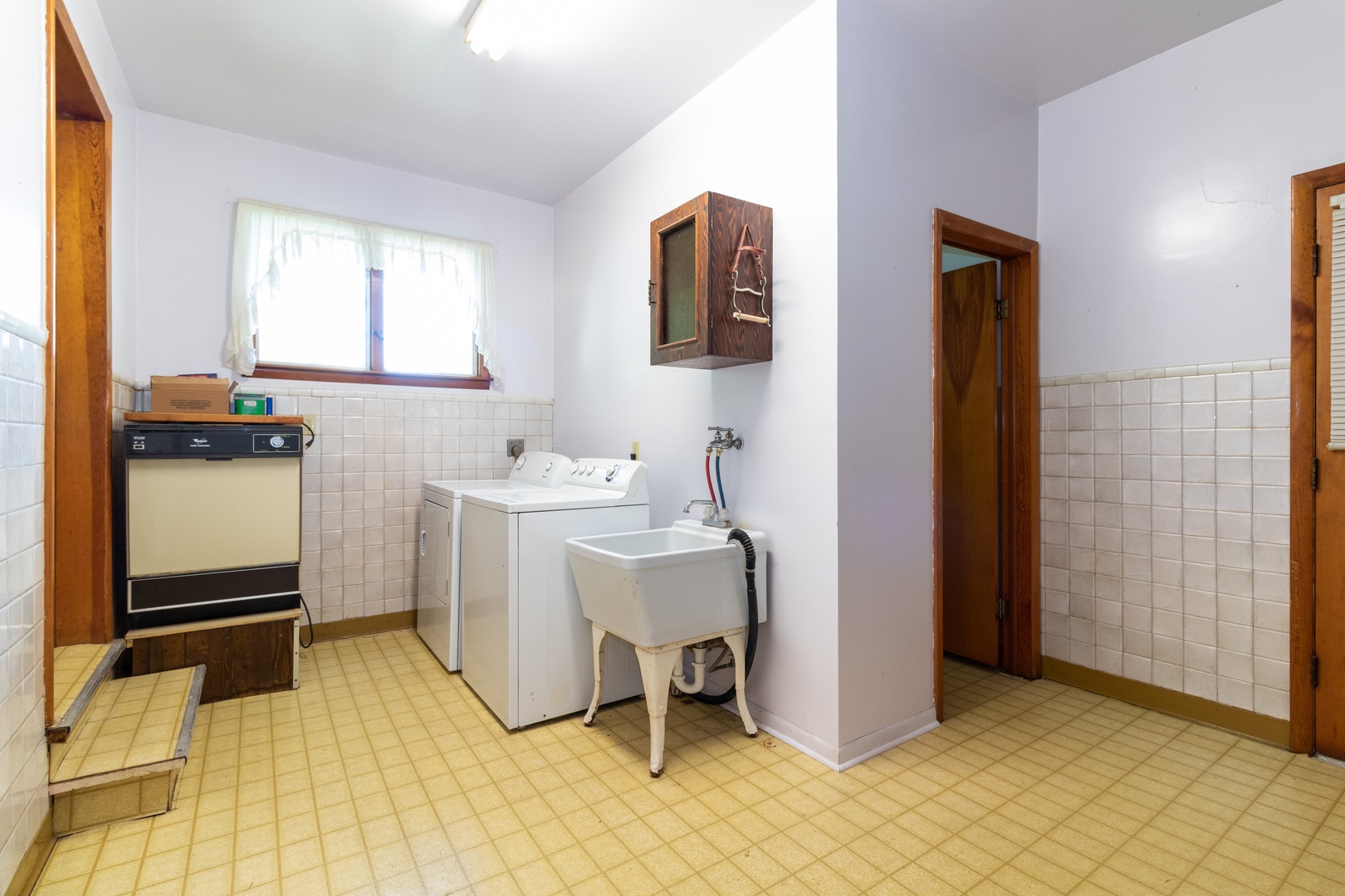 3604 177th Place Lansing, IL 60438 - Photo 11 of 13 a view of a workspace with furniture and a window