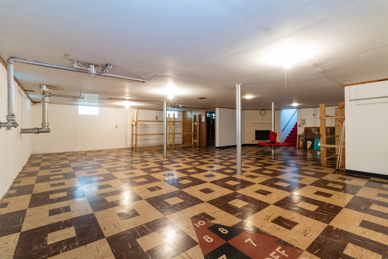 3604 177th Place Lansing, IL 60438 - Photo 12 of 13 a view of a water heater room with a rug