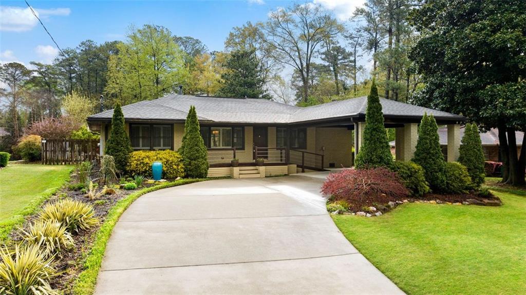 1720 Briarlake Circle Decatur, GA 30033 - Photo 1 of 1 a front view of a house with a yard