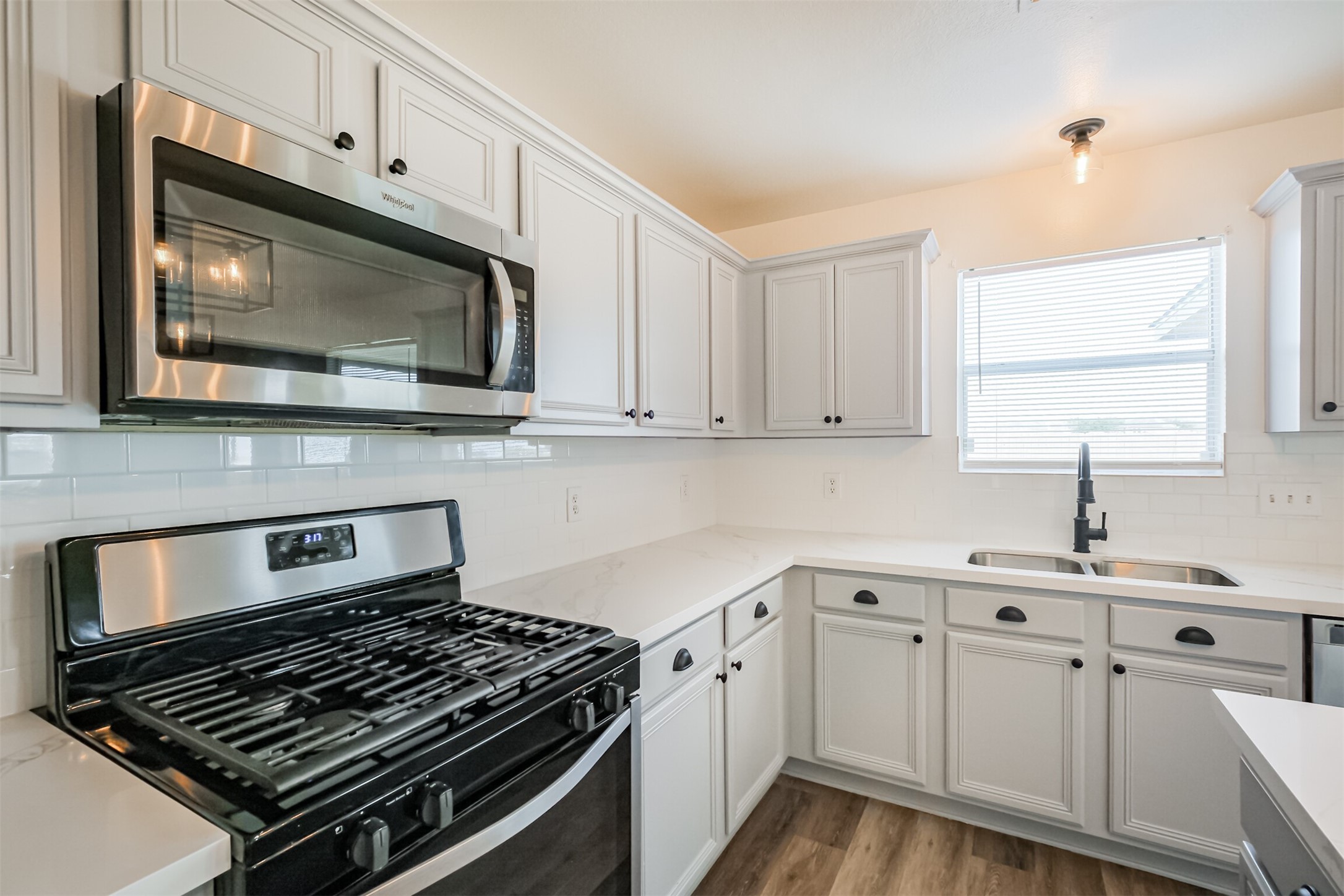 2030 Vanderwilt Court Katy, TX 77449 - Photo 11 of 36 Plenty of storage and gas cooktop and oven.
