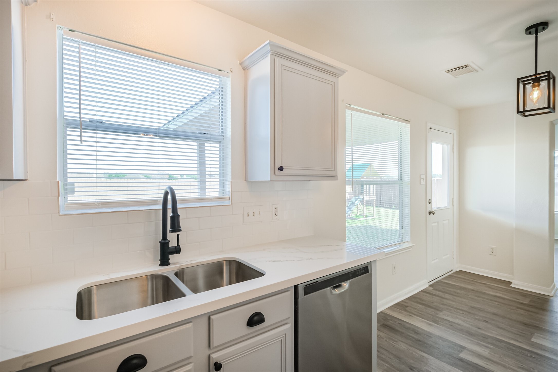 2030 Vanderwilt Court Katy, TX 77449 - Photo 13 of 36 There is a great view of the outside areas from the kitchen sink.