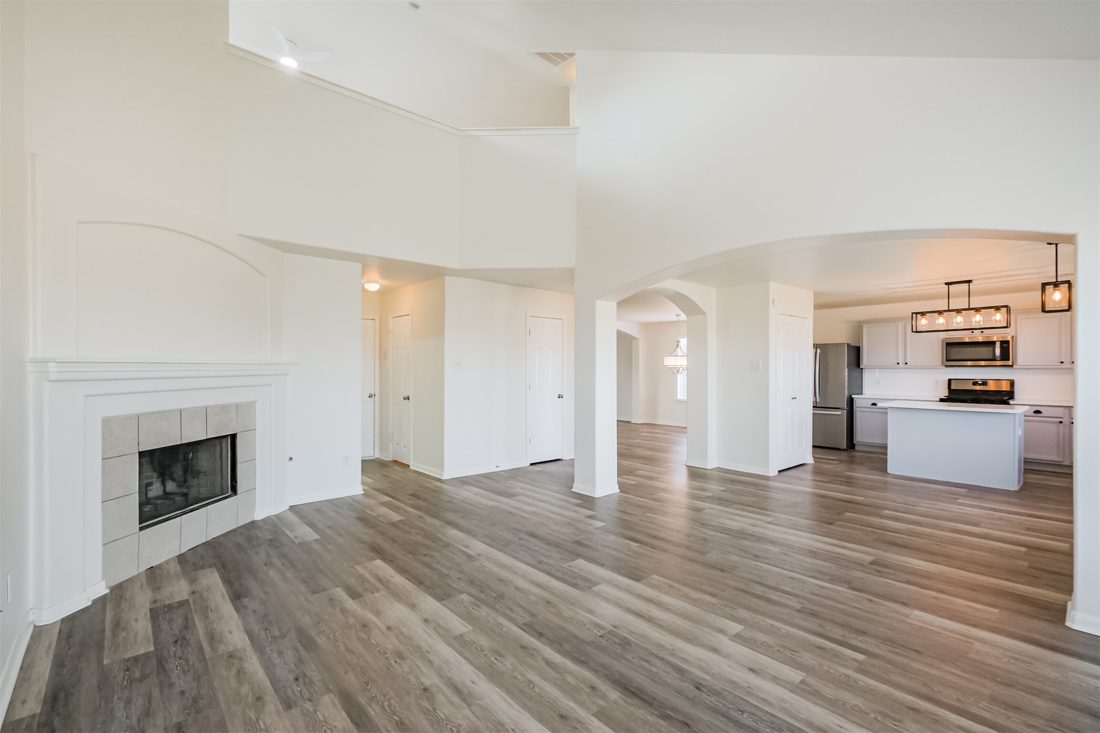 2030 Vanderwilt Court Katy, TX 77449 - Photo 15 of 36 The other living room - the family den with gas fireplace and high ceilings.