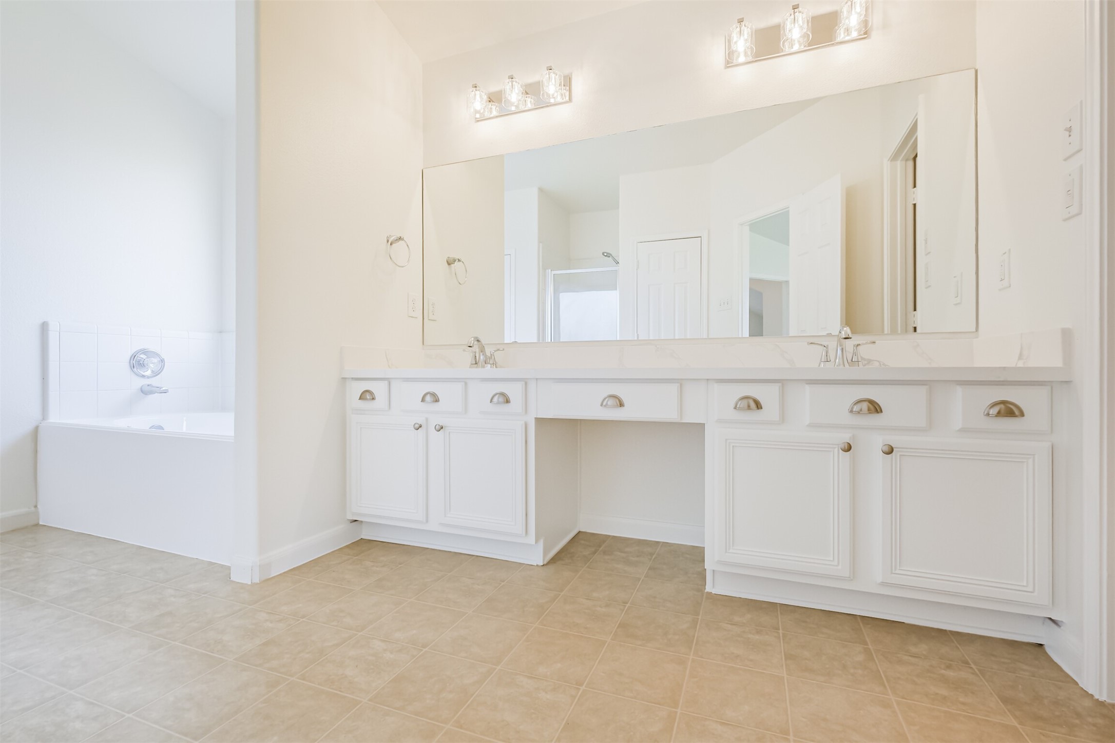 2030 Vanderwilt Court Katy, TX 77449 - Photo 23 of 36 The primary bathroom - new counters, faucets, mirrors, lights - enjoy the newness!