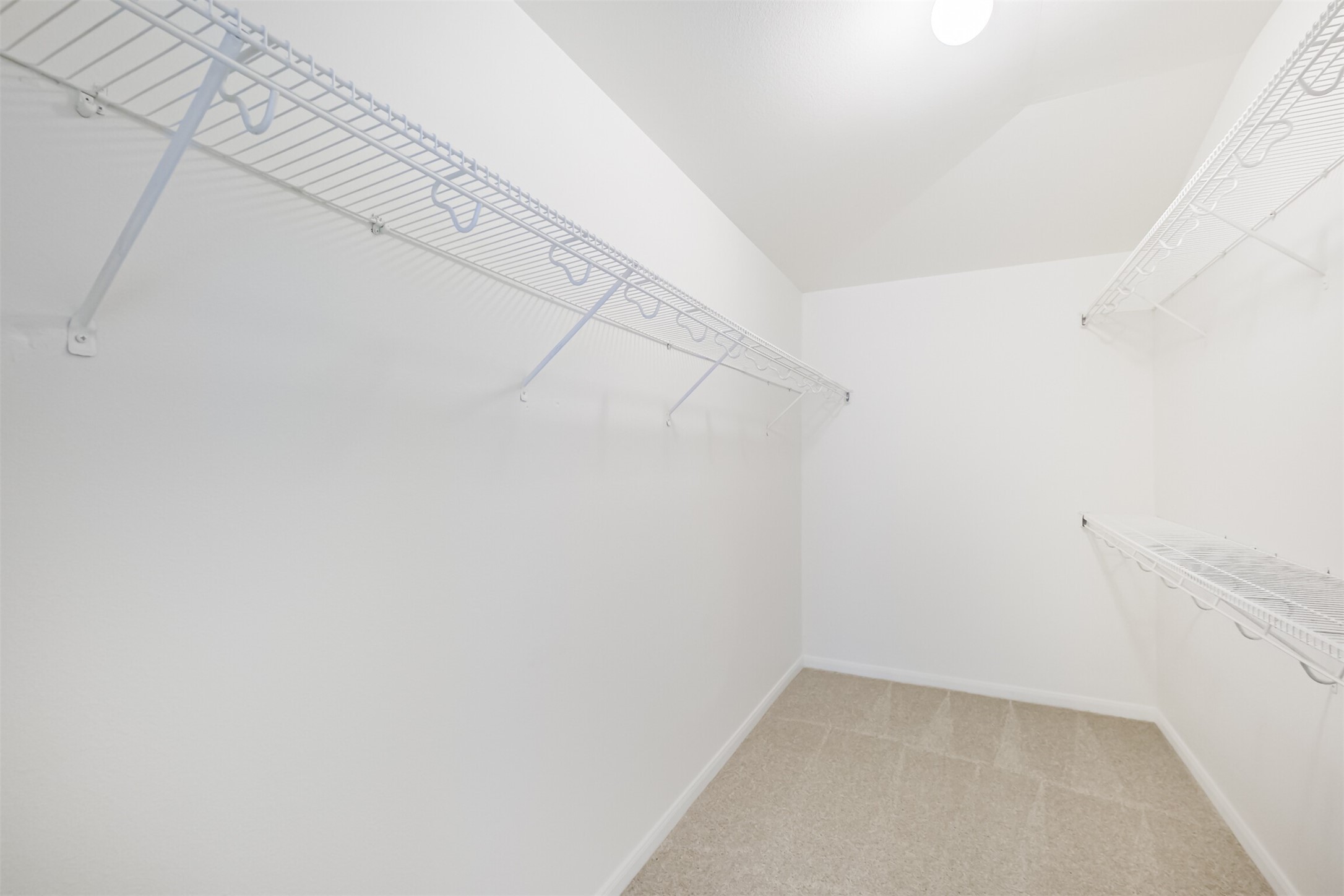 2030 Vanderwilt Court Katy, TX 77449 - Photo 25 of 36 Large primary closet - plenty of hanging space.