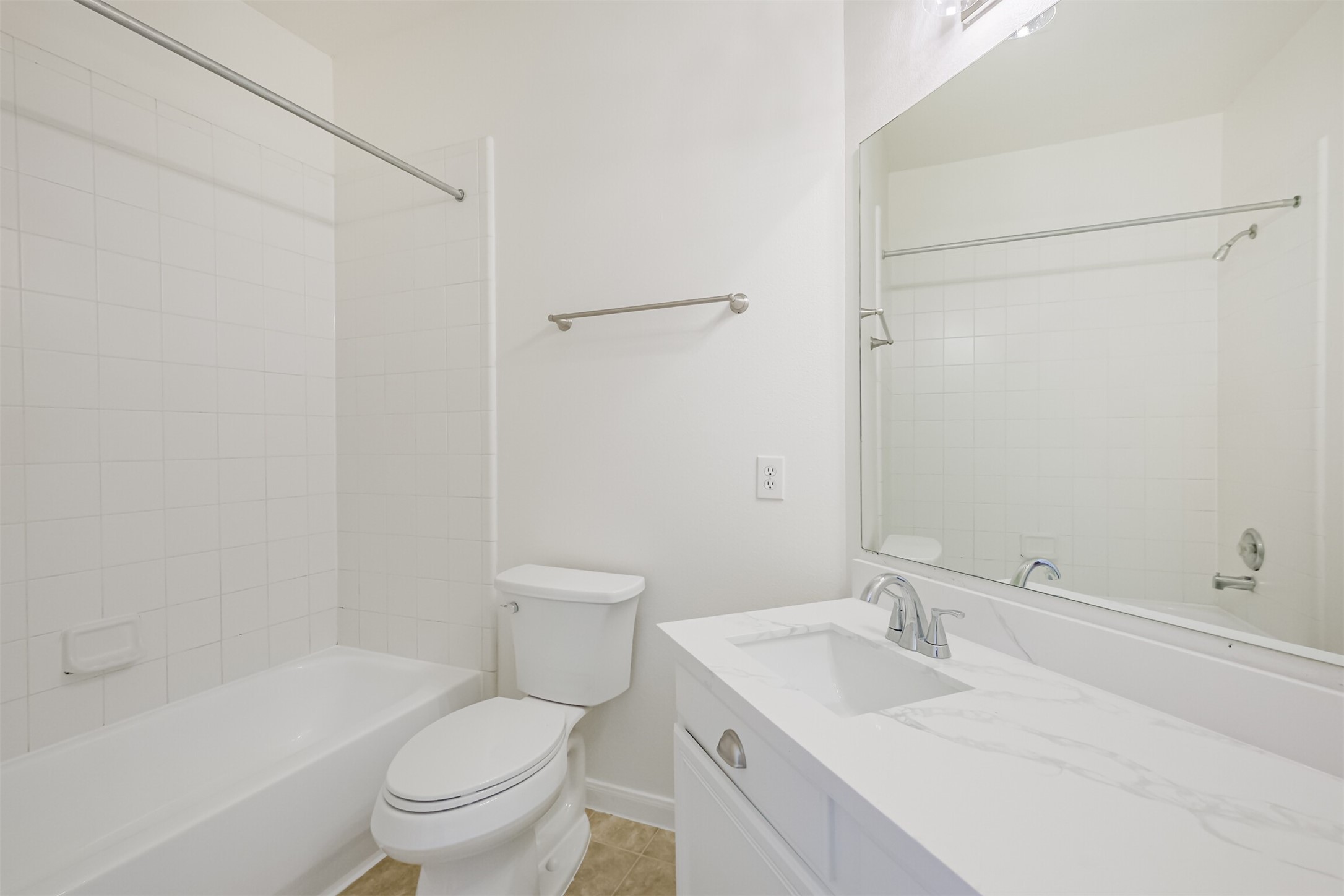 2030 Vanderwilt Court Katy, TX 77449 - Photo 29 of 36 The secondary bathroom with bath and shower. Everything new!