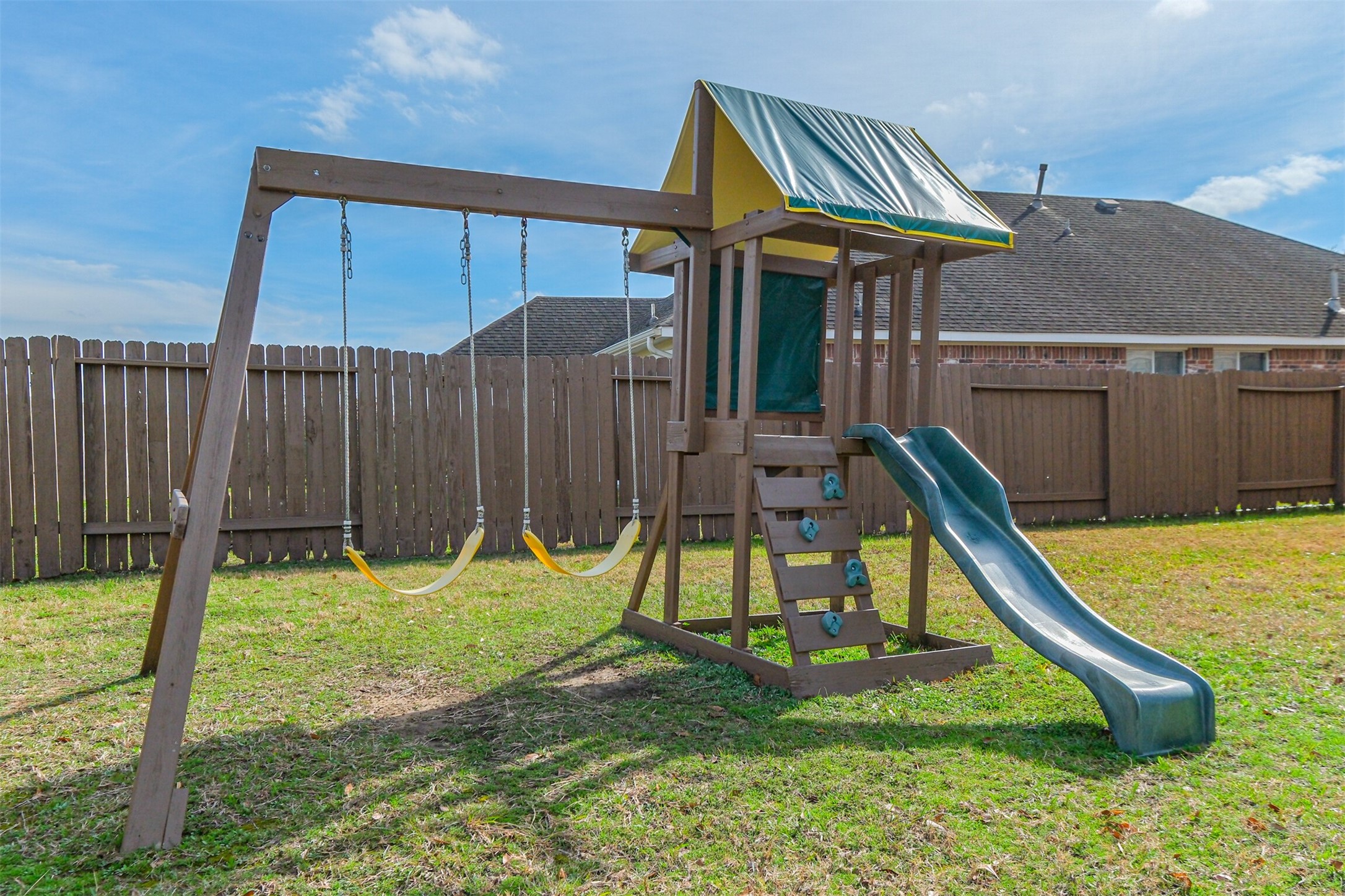 2030 Vanderwilt Court Katy, TX 77449 - Photo 32 of 36 Kids playset in the backyard.