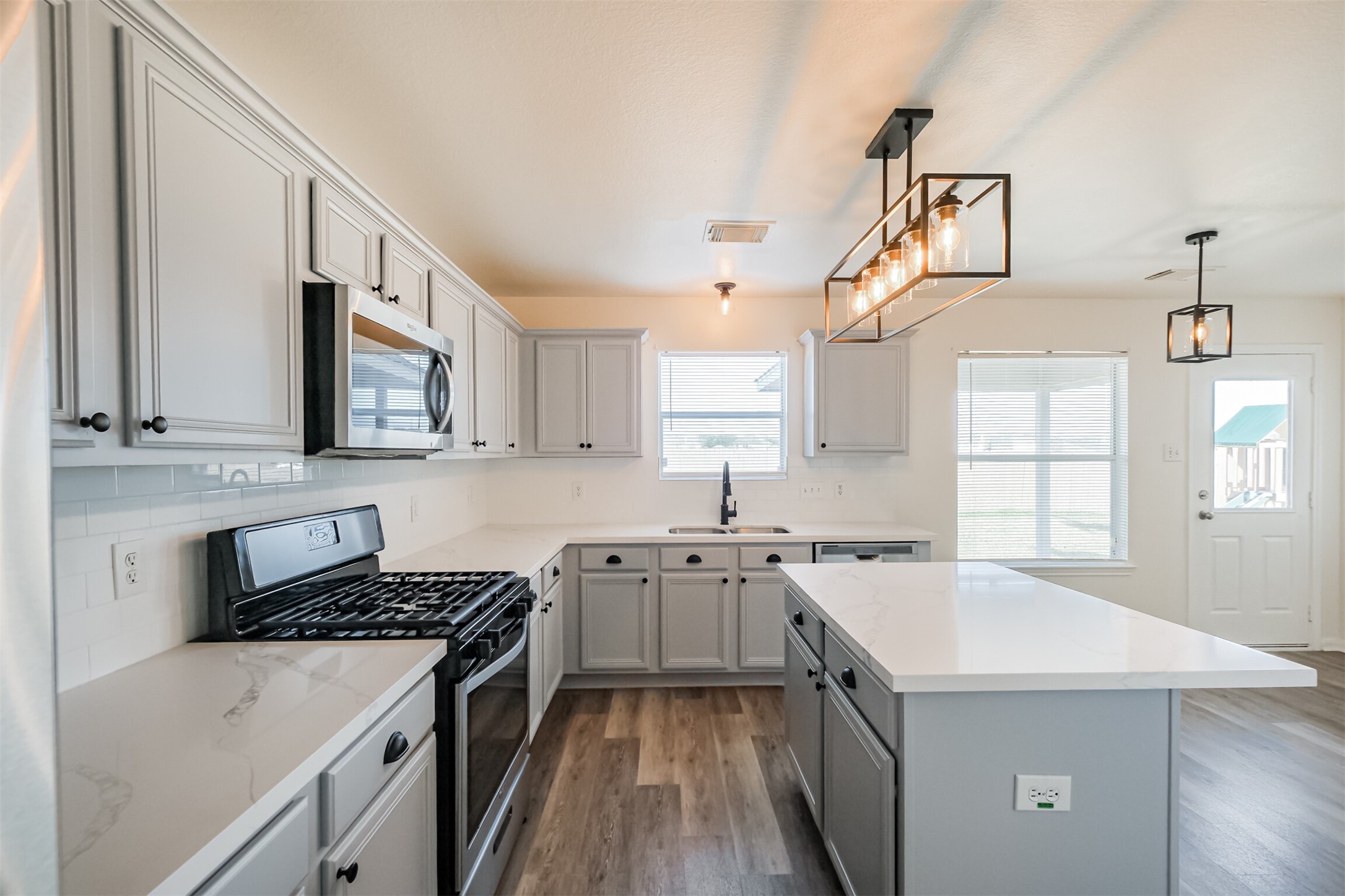 2030 Vanderwilt Court Katy, TX 77449 - Photo 10 of 36 Clean surfaces, sparkling appliances and natural light. Fridge / Freezer is included in the rental.
