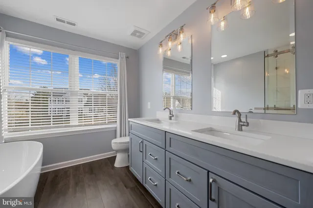 a view of empty room with fan