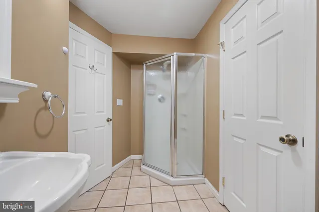 a view of a big room with carpet