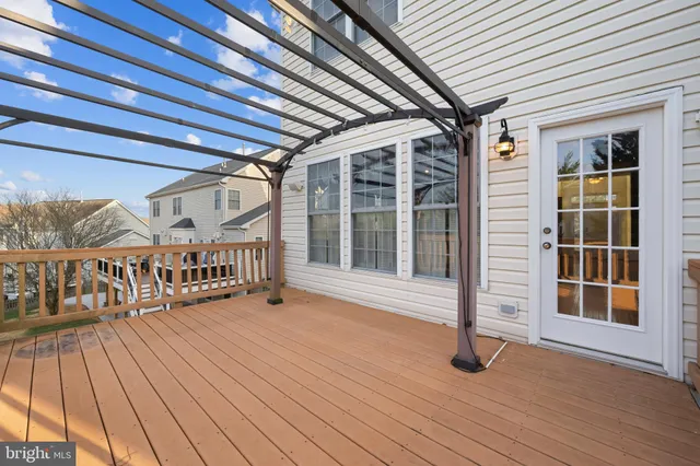 a balcony with wooden floor