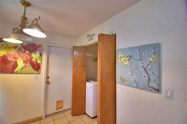 a bathroom with a mirror and a shower