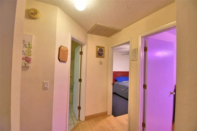 a bedroom with a bed and a bathroom