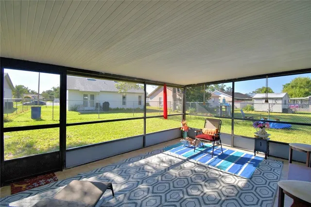a view of a sitting area with furniture and sitting area