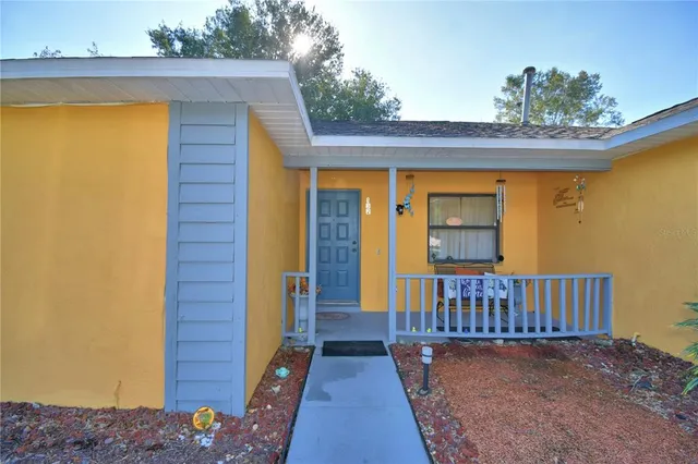 a view of a house with a porch