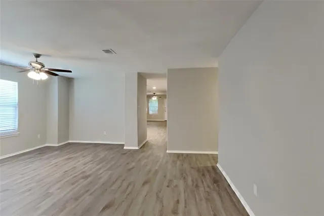 a view of a livingroom with wooden floor