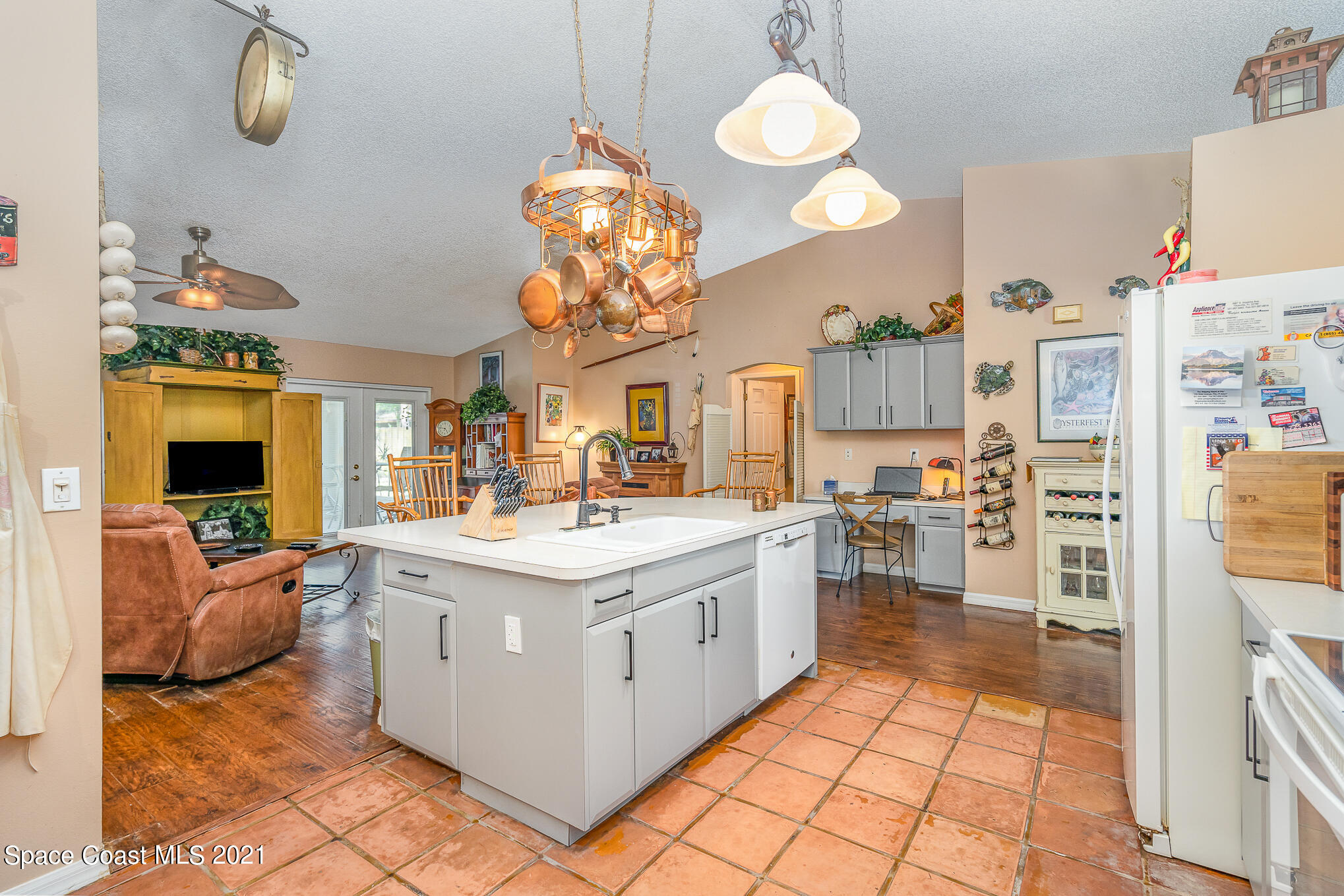 6330 Irving Road Cocoa, FL 32927 - Photo 8 of 22 a kitchen with a sink and cabinets
