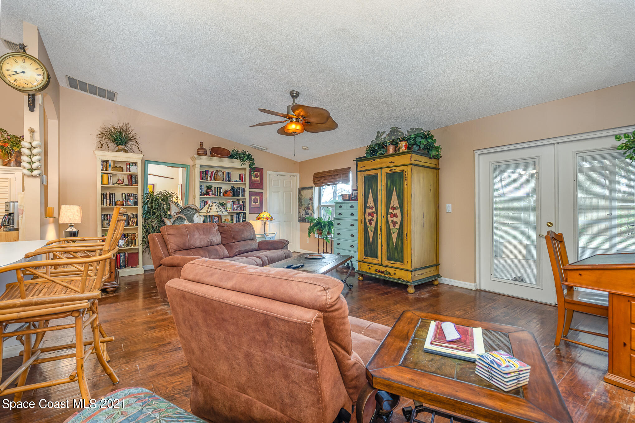 6330 Irving Road Cocoa, FL 32927 - Photo 9 of 22 a living room with patio furniture and a window
