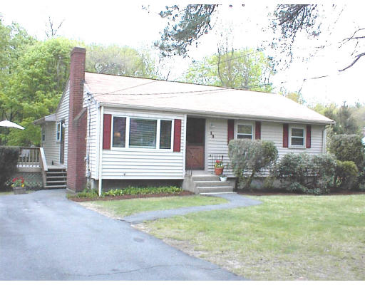 18 Lyndon Road Sharon, MA 02067 - Photo 1 of 12 a view of a house with backyard and sitting area