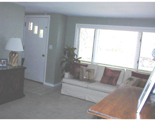 18 Lyndon Road Sharon, MA 02067 - Photo 3 of 12 a living room with furniture and a large window
