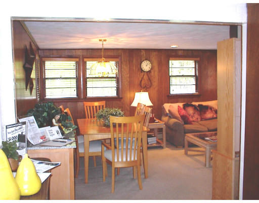 18 Lyndon Road Sharon, MA 02067 - Photo 5 of 12 a view of a dining room with furniture window and outside view