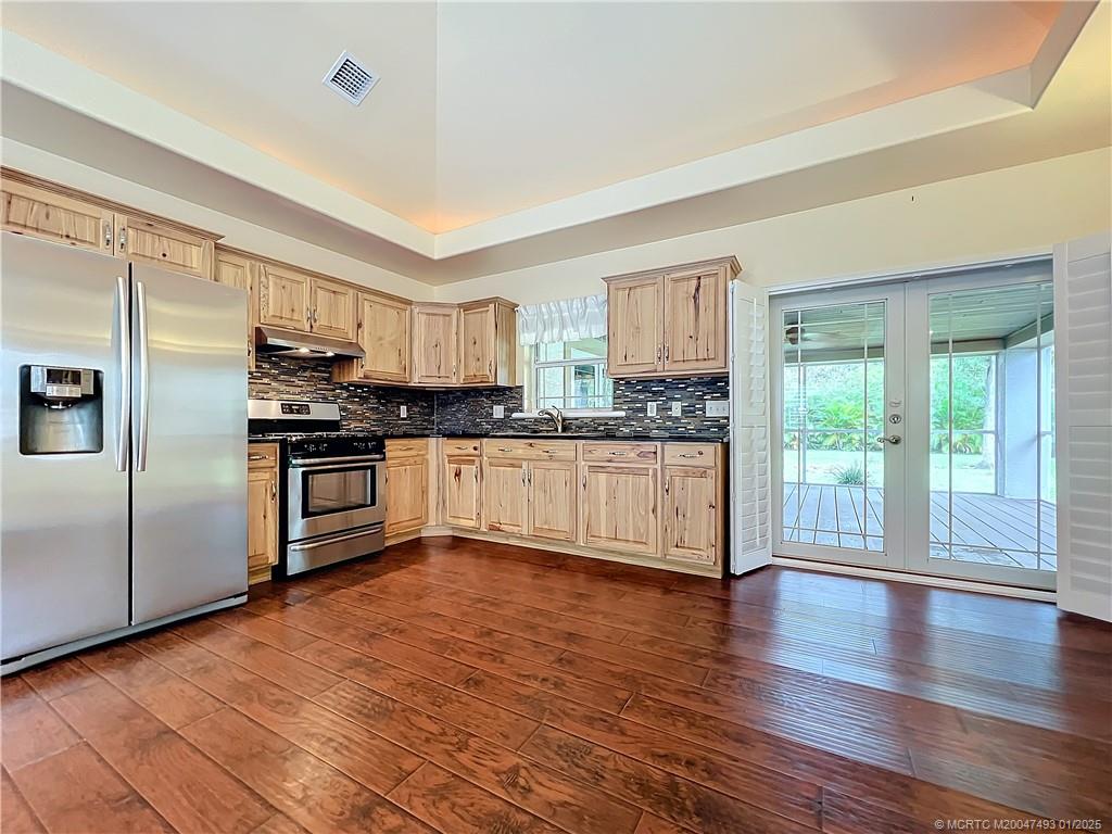 626 Russ Road Fort Pierce, FL 34982 - Photo 18 of 72 Impact French doors to large, screened porch. Lami