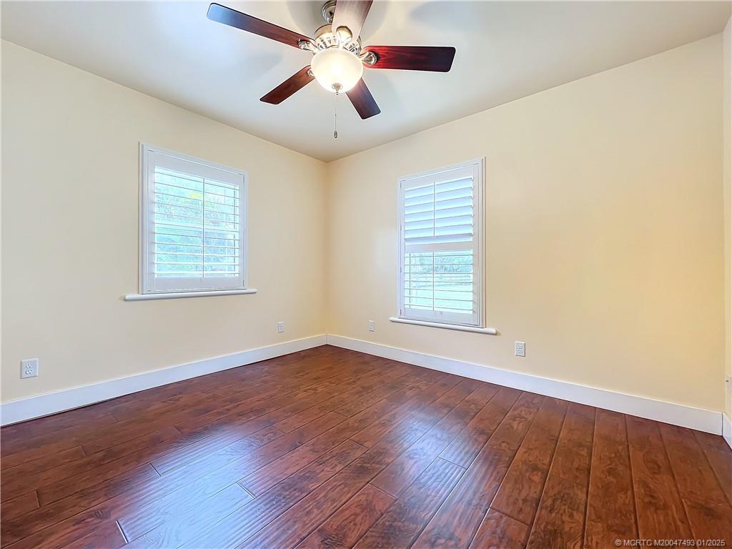 626 Russ Road Fort Pierce, FL 34982 - Photo 26 of 72 2 windows and plantation shutters. Fan with a lig