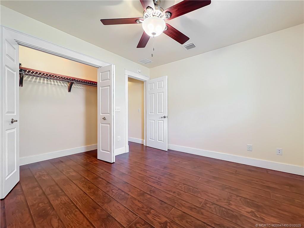 626 Russ Road Fort Pierce, FL 34982 - Photo 31 of 72 Laminate floors. fand with a light. Windows with
