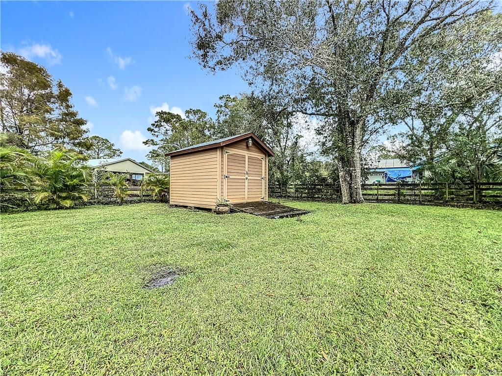 626 Russ Road Fort Pierce, FL 34982 - Photo 53 of 72 Shed WITH A RAMP FOR THAT EXTRA STOARGE LOOK AT TH