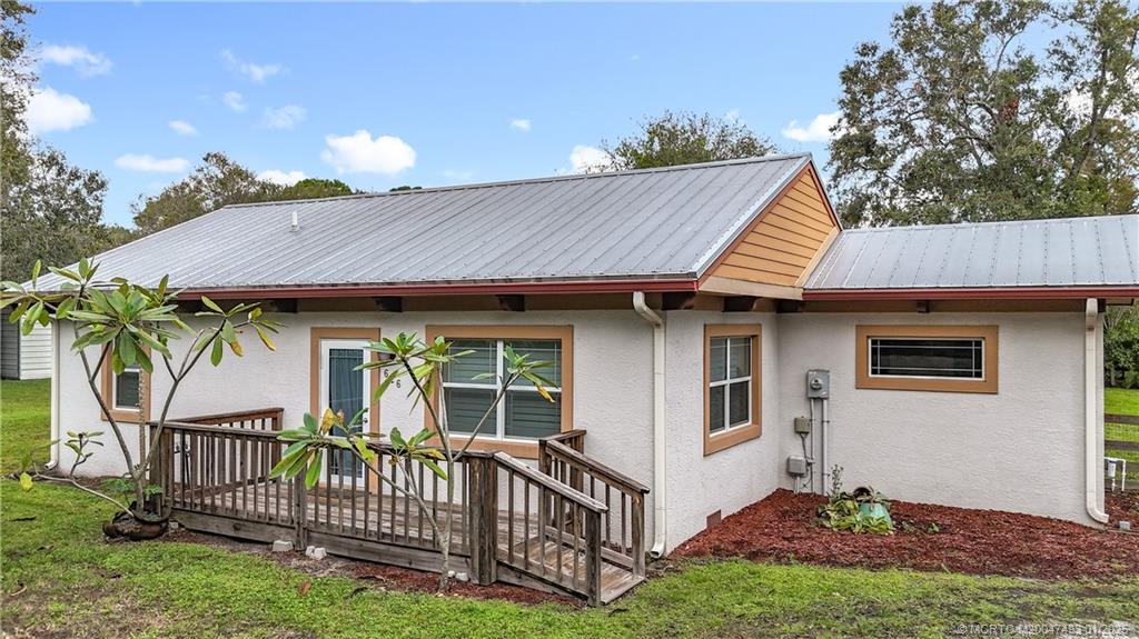 626 Russ Road Fort Pierce, FL 34982 - Photo 54 of 72 Nice front porch with a ramp. CBS home with stucco