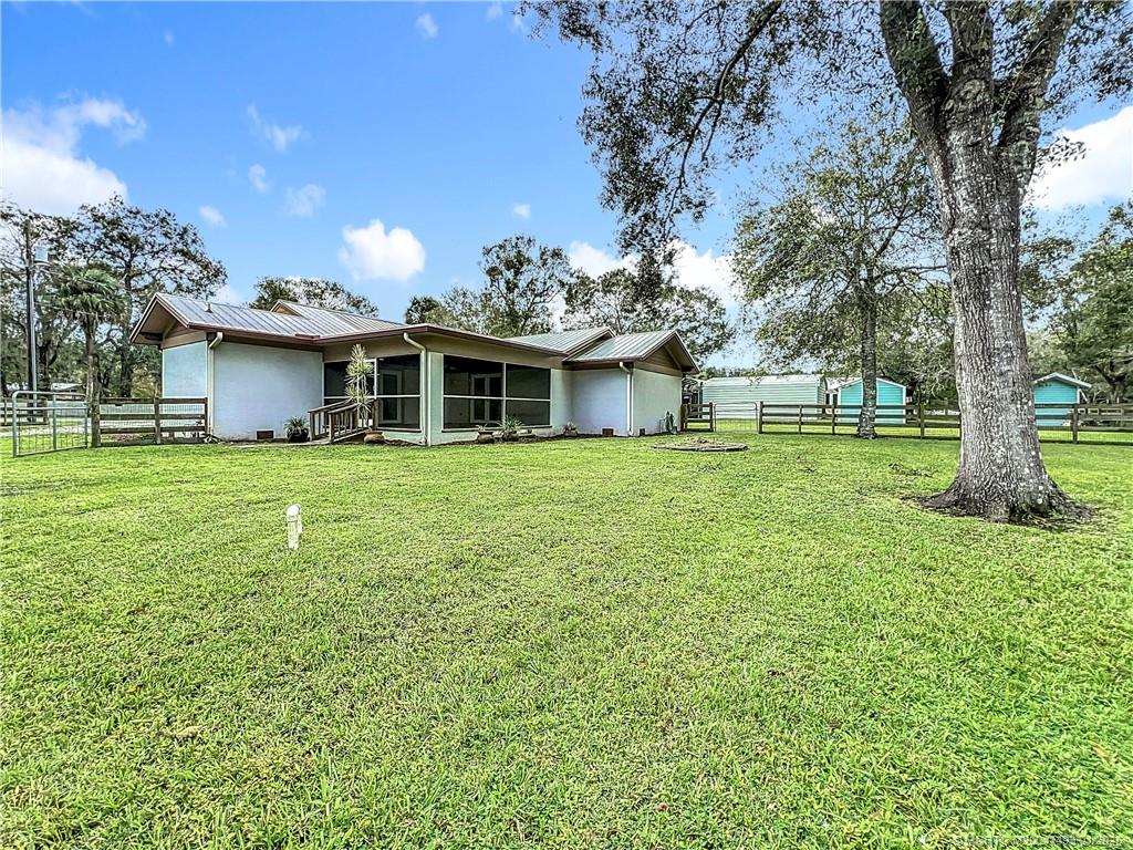 626 Russ Road Fort Pierce, FL 34982 - Photo 55 of 72 You have a ramp to go into the back porch patio ar