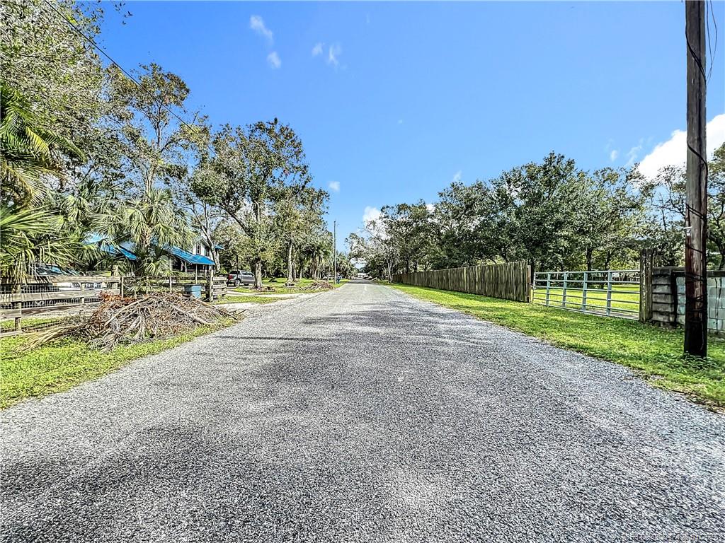 626 Russ Road Fort Pierce, FL 34982 - Photo 60 of 72 The road coming in now the home is on the left sid