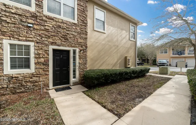 a view of a entryway door front of house
