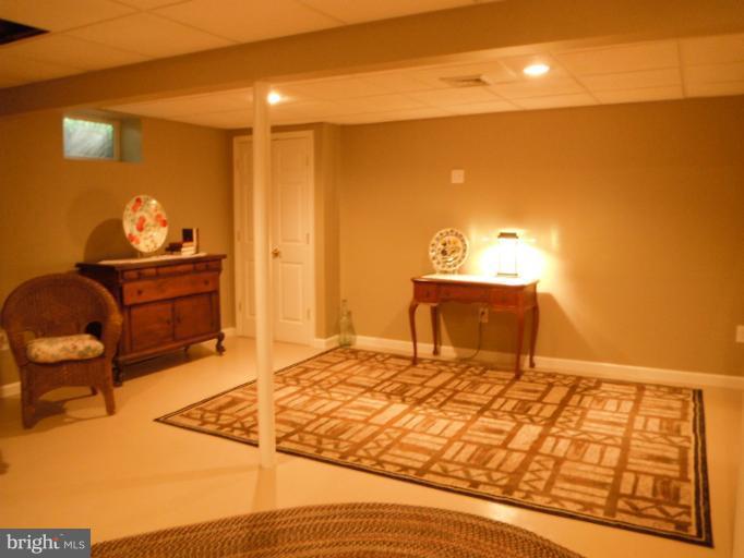 7525 Old Columbia Road Laurel, MD 20723 - Photo 5 of 29 Sitting room with wood stove