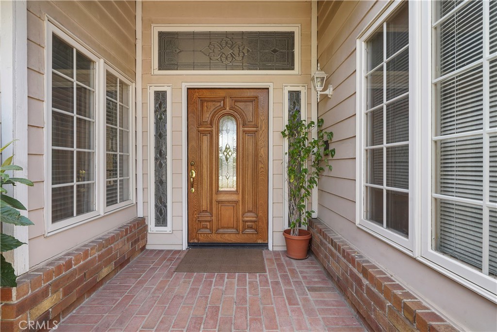 18782 Willowtree Lane Porter Ranch, CA 91326 - Photo 29 of 33 a view of front door of house and deck