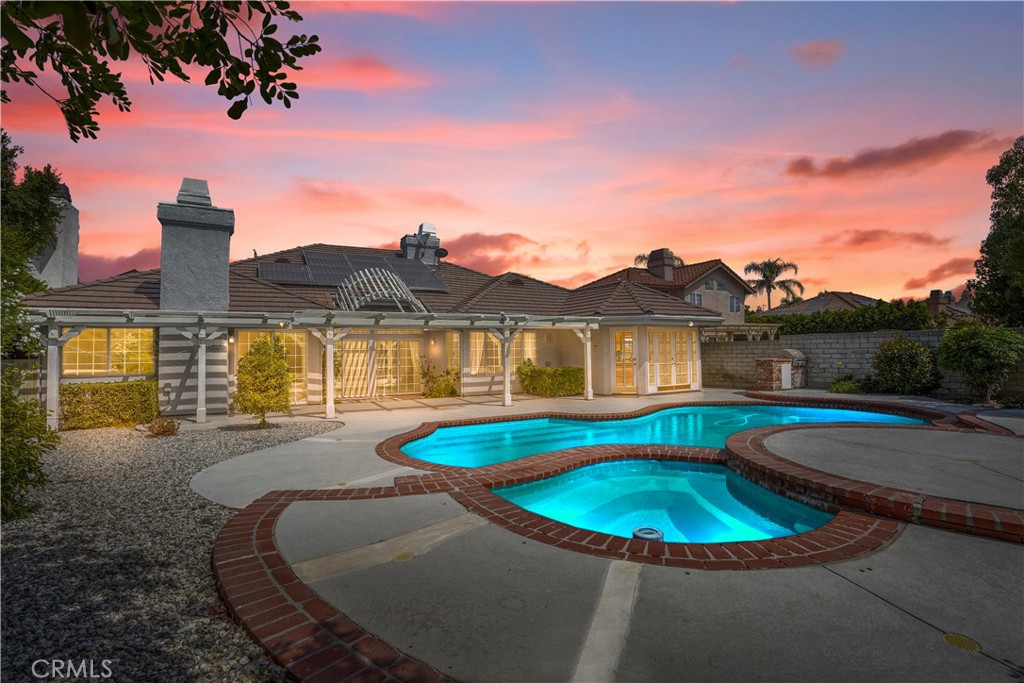 18782 Willowtree Lane Porter Ranch, CA 91326 - Photo 3 of 33 a view of a house with pool