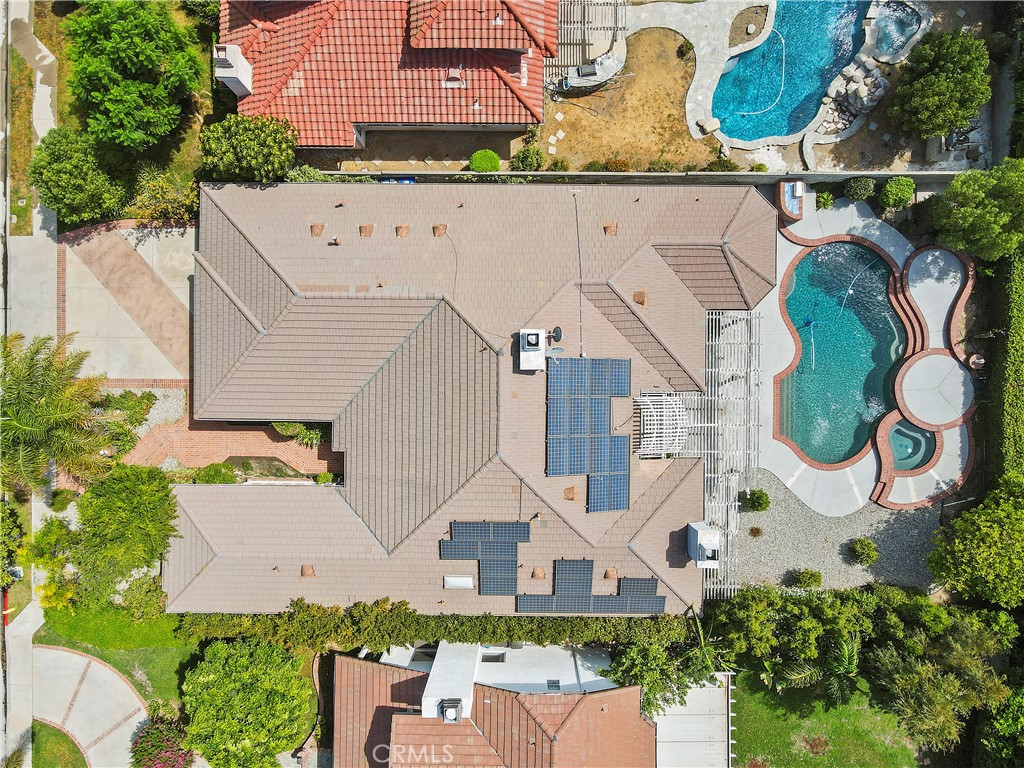 18782 Willowtree Lane Porter Ranch, CA 91326 - Photo 7 of 33 an aerial view of a house with garden space and street view