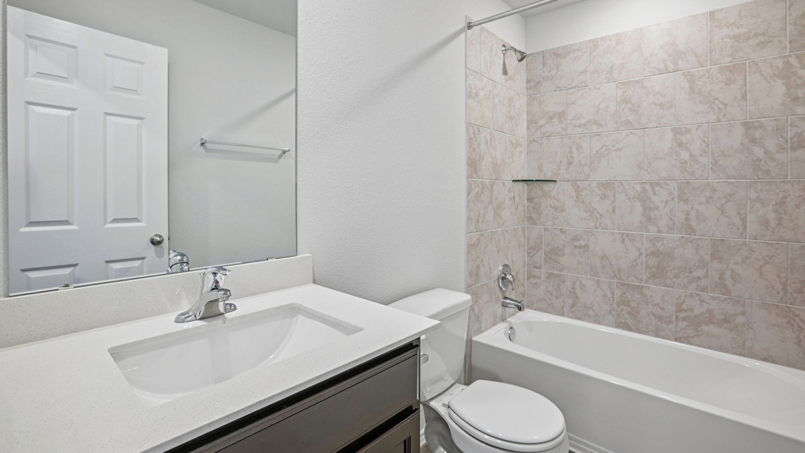 156 Wyatt Way Jarrell, TX 76537 - Photo 28 of 30 Bathroom featuring a white integrated sink, chrome faucet, and a light-colored countertop