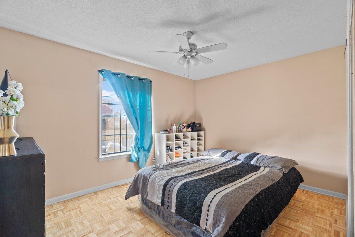 3442 Wythe Road Memphis, TN 38134 - Photo 11 of 21 a bedroom with a bed and a window