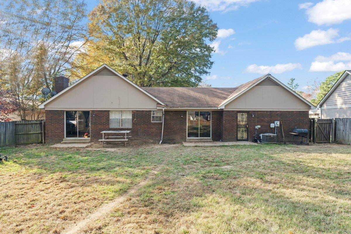 3442 Wythe Road Memphis, TN 38134 - Photo 21 of 21 a front view of a house with a yard and trees
