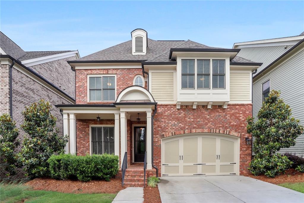 Welcome to Beautiful 890 Olmsted Lane in the sought-after gated community of Bellmoore Park in Johns Creek!