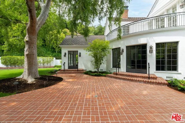 a view of a room with a large window