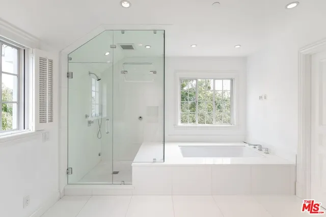 a balcony with a flat screen tv