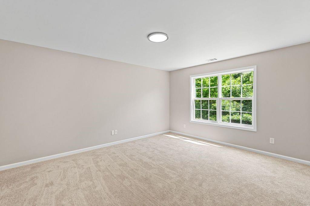 473 Greyhawk Way Fairburn, GA 30213 - Photo 20 of 34 a view of a livingroom with a window