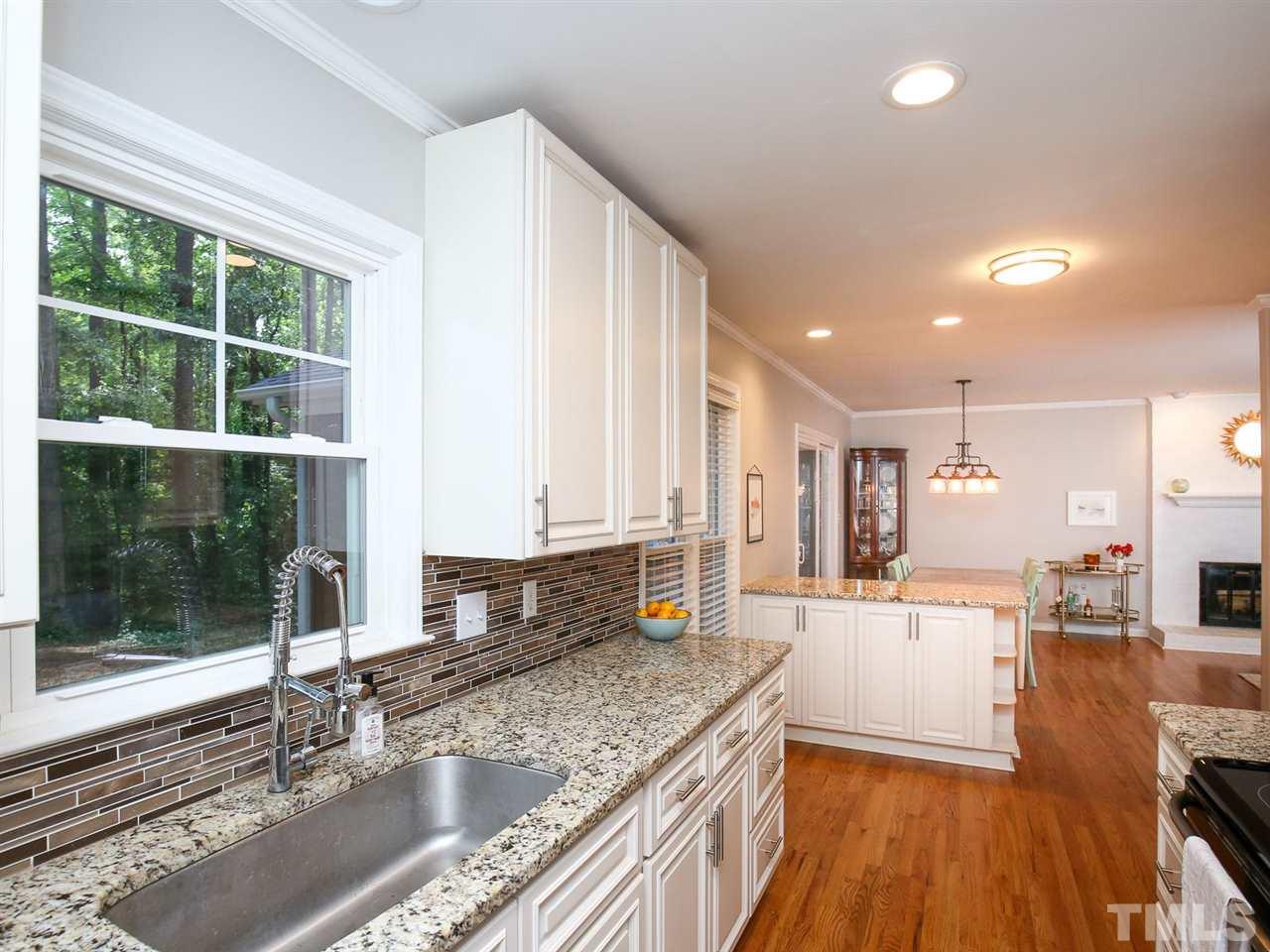 4012 Cardigan Place Raleigh, NC 27609 - Photo 30 of 30 Open floorplan from the kitchen to the family room!