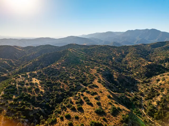 a view of a house with a mountain