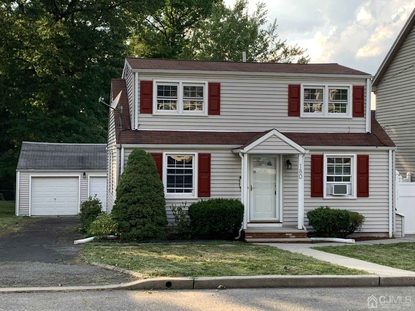 180 East Cliff Road Colonia, NJ 07067 - Photo 1 of 6 a view of a house with a yard