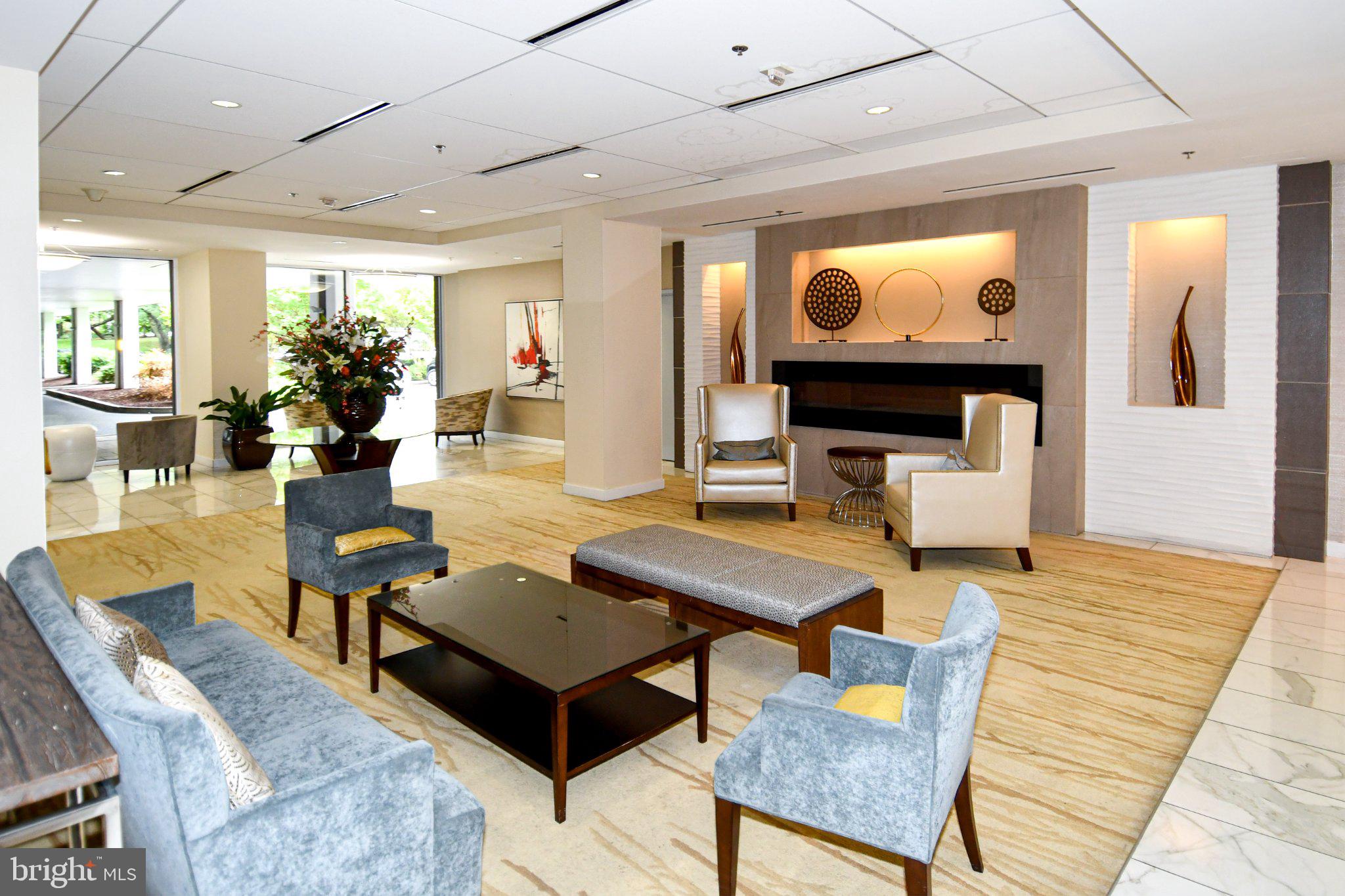 5101 River Road, Unit 712 Bethesda, MD 20816 - Photo 32 of 38 Modern elegance in a welcoming lobby.