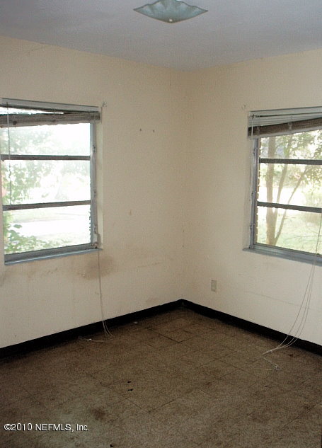 3211 Kline Road Jacksonville, FL 32246 - Photo 6 of 10 a view of an empty room with a window
