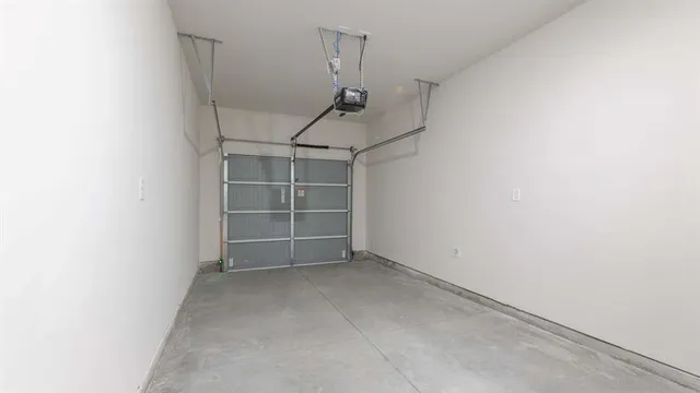 a view of house with backyard and sitting area